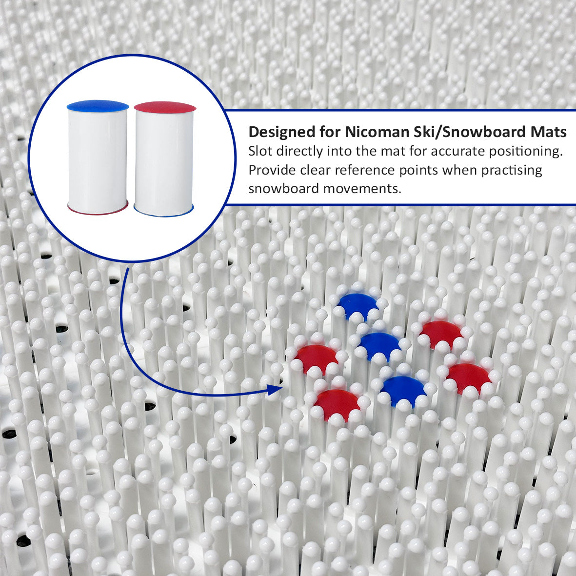 White ski markers with red and blue tops slotted into the ski training mat.