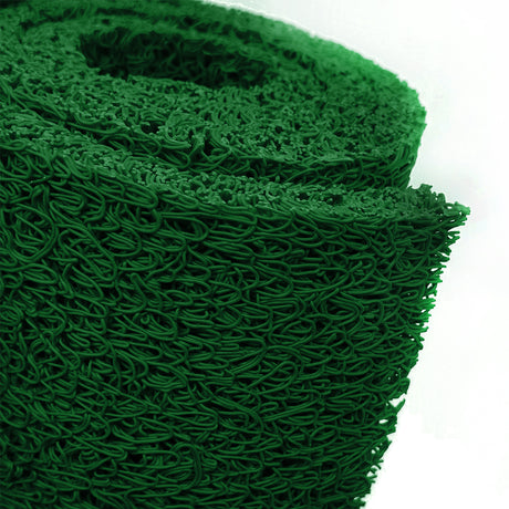 Roll of green spaghetti mat on a white background