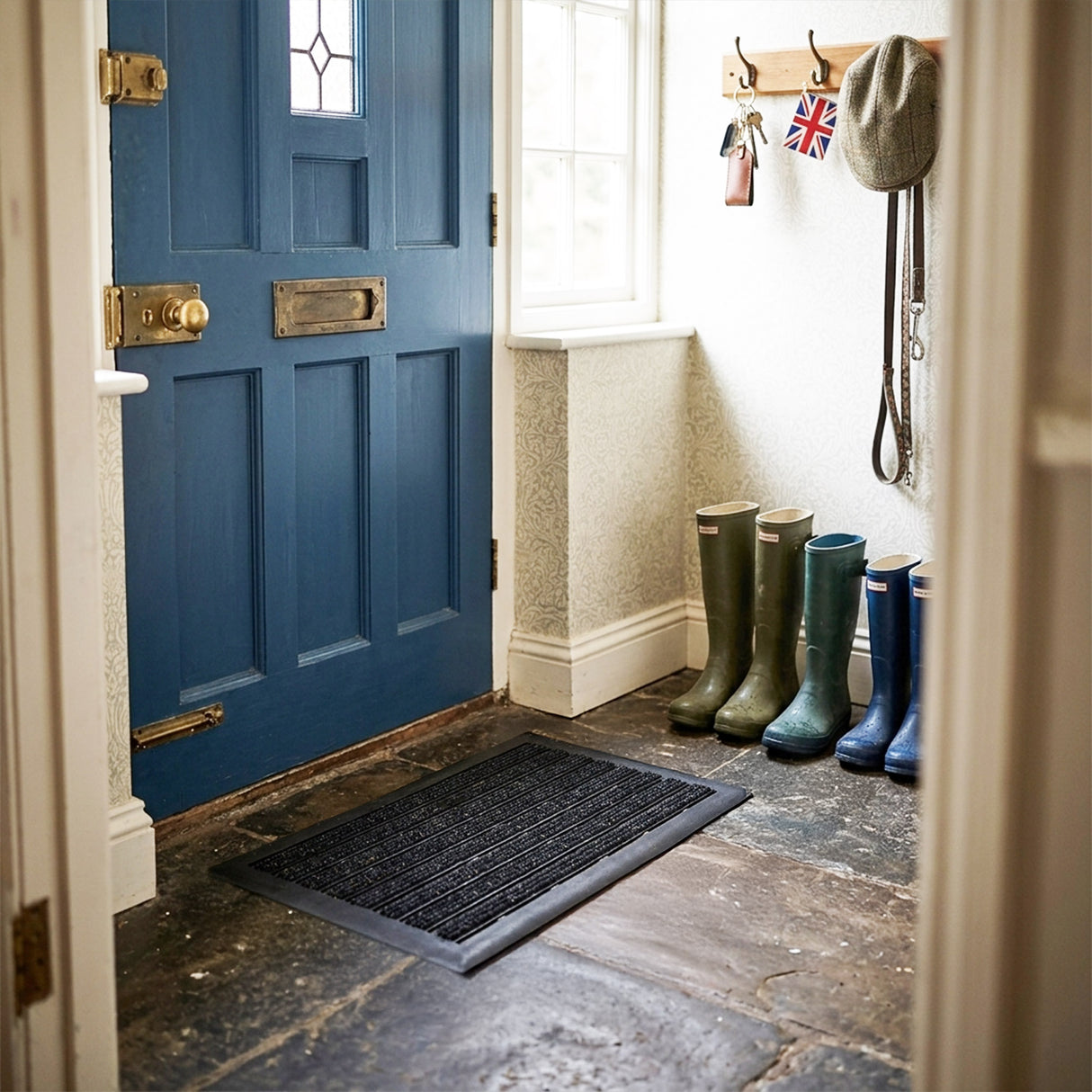 Integrated Brush Strip Door Mat with Elevated Drainage Design