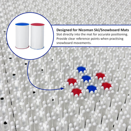 White ski markers with red and blue tops slotted into the ski training mat. 